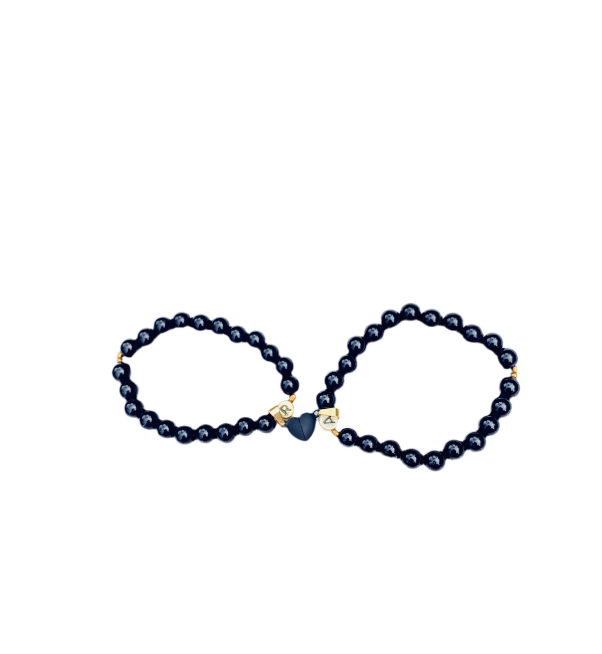 Magical black heart bracelet pair .