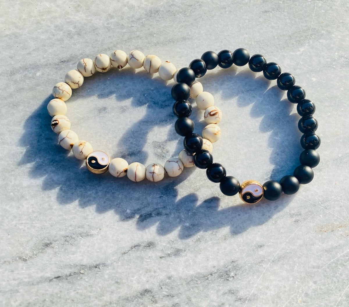 Yin / yang bracelets